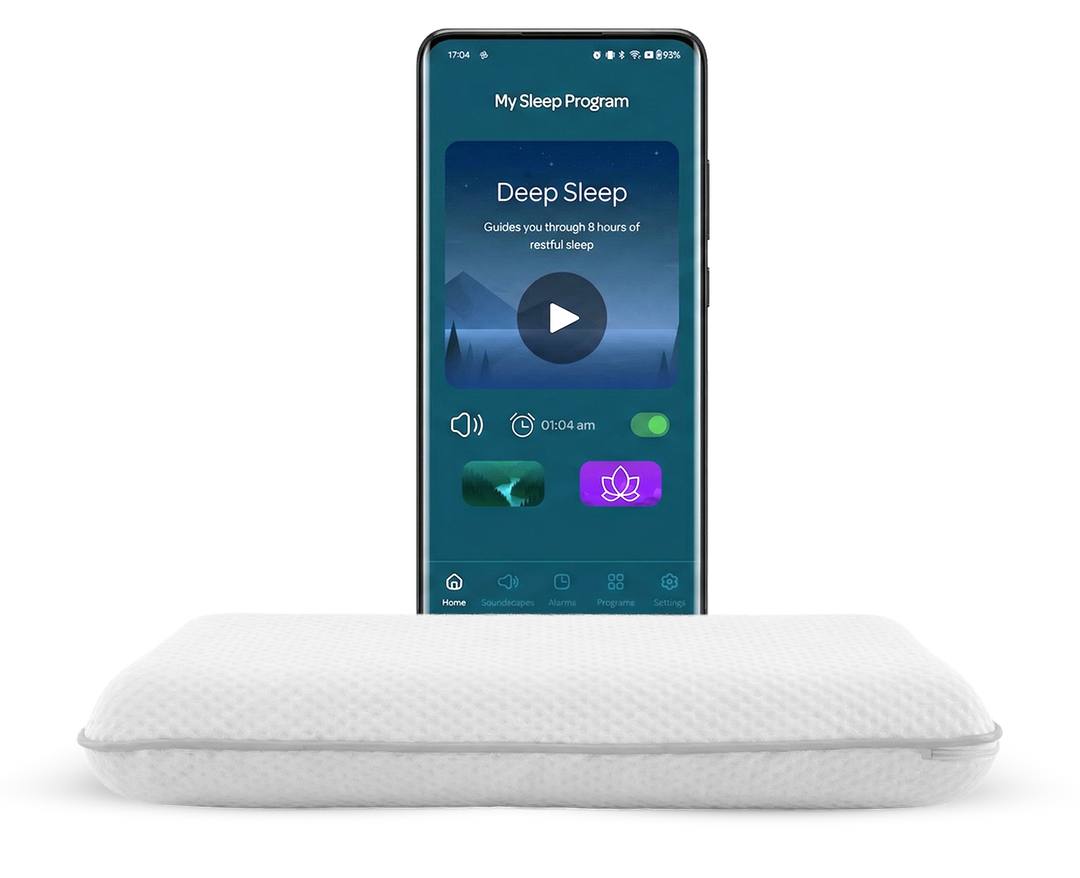 SleepEngine™ POD audio device shown beside a pillow with the sleep app open on a phone