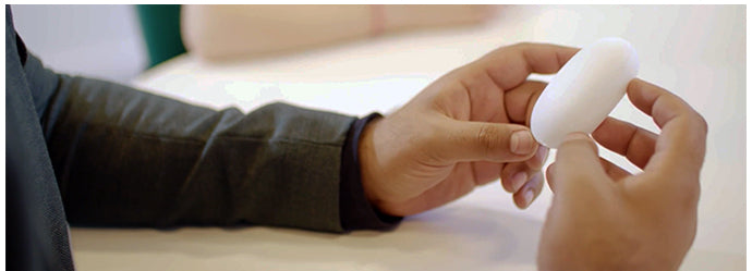Photograph: Hands holding Sleephub Anywhere